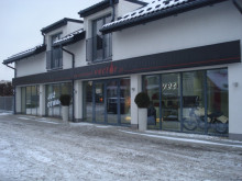 Nowy salon firmy Kominki -Vector
